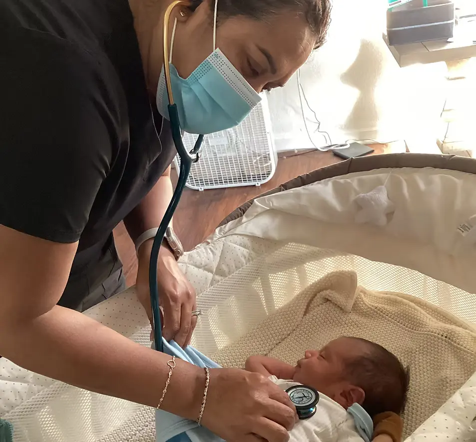 Pediatric nurse engaging with child patient